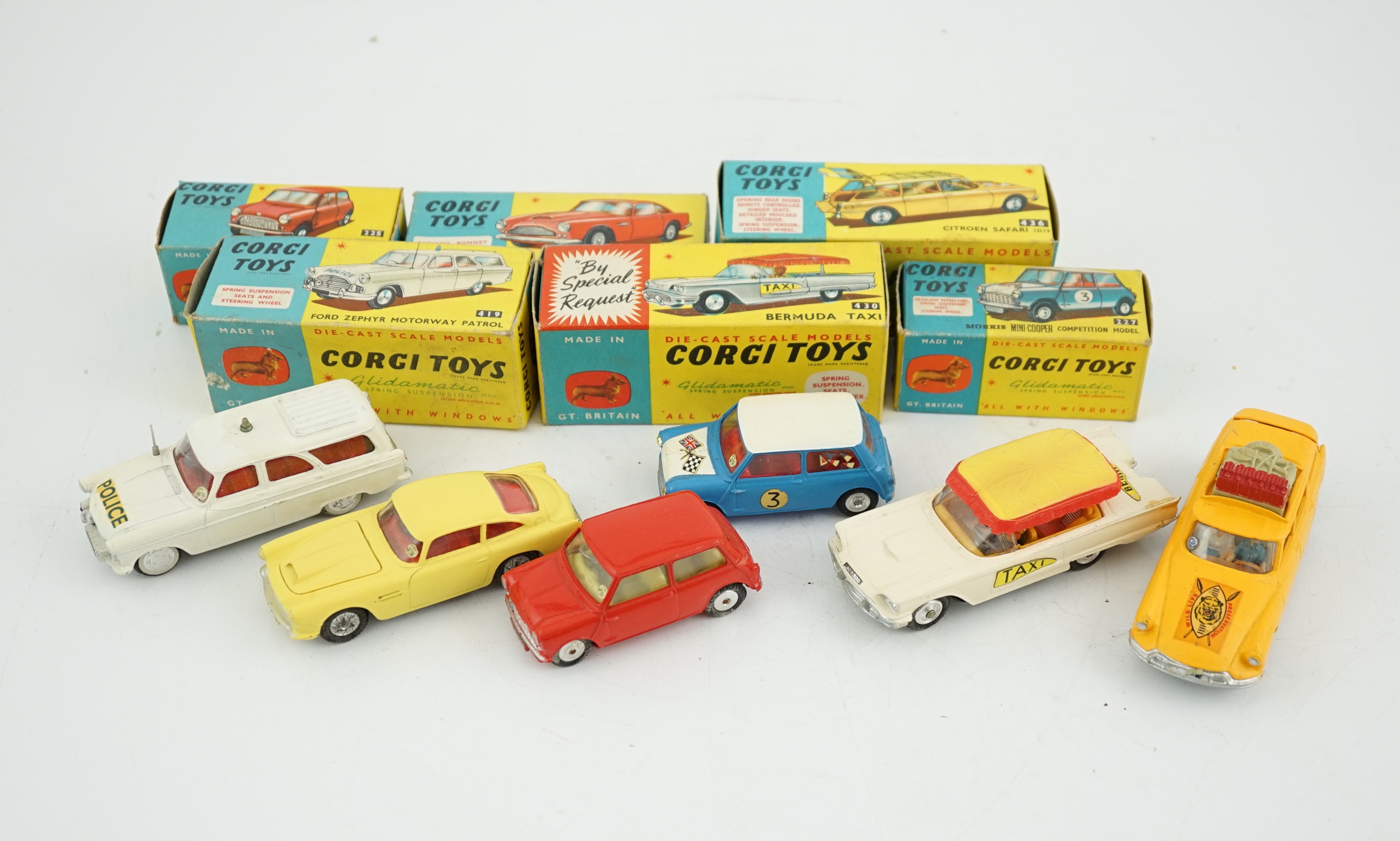 Six boxed Corgi Toys cars; Aston Martin DB4 in yellow (218), Austin seven in red (225), Morris Mini Cooper competition model (227), Ford Zephyr motorway patrol (419), Ford Thunderbird Bermuda Taxi (430), Citroen Safari (